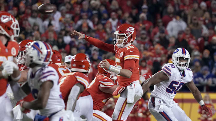 Jan 23, 2022; Kansas City, Missouri, USA; Kansas City Chiefs quarterback Patrick Mahomes (15) passing against the Buffalo Bills during overtime in the AFC Divisional playoff football game at GEHA Field at Arrowhead Stadium. Mandatory Credit: Denny Medley-Imagn Images Jan 23, 2022; Kansas City, Missouri, USA; Kansas City Chiefs quarterback Patrick Mahomes (15) passing against the Buffalo Bills during overtime in the AFC Divisional playoff football game at GEHA Field at Arrowhead Stadium. Mandatory Credit: Denny Medley-Imagn Images