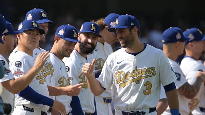 Mar 27, 2025; Los Angeles, California, USA; Los Angeles Dodgers outfielder Chris Taylor (3) reacts with teammates before the game against the Detroit Tigers at Dodger Stadium. Mandatory Credit: Jayne Kamin-Oncea-Imagn Images Mar 27, 2025; Los Angeles, California, USA; Los Angeles Dodgers outfielder Chris Taylor (3) reacts with teammates before the game against the Detroit Tigers at Dodger Stadium. Mandatory Credit: Jayne Kamin-Oncea-Imagn Images