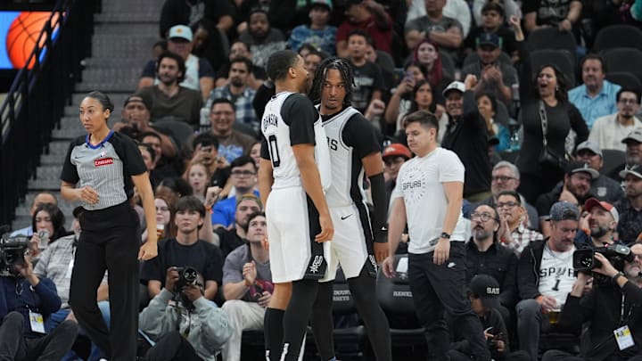 Mar 4, 2025; San Antonio, Texas, USA;  San Antonio Spurs forward Keldon Johnson (0) and guard Stephon Castle (5) celebrate in the second half against the Brooklyn Nets at Frost Bank Center. Mandatory Credit: Daniel Dunn-Imagn Images