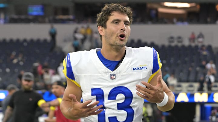 Aug 9, 2025; Inglewood, California, USA;  Los Angeles Rams quarterback Stetson Bennett IV (13) leaves the field after the game against the Dallas Cowboys at SoFi Stadium. Mandatory Credit: Jayne Kamin-Oncea-Imagn Images