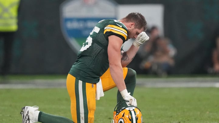 Sep 6, 2024; Sao Paulo, BRA; Green Bay Packers tight end Tucker Kraft (85) reacts after an injury during the second half against the Philadelphia Eagles at Neo Quimica Arena. Mandatory Credit: Kirby Lee-Imagn Images