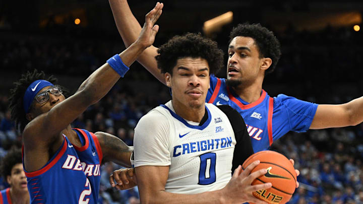 DePaul Blue Demons guard Layden Blocker (2) defends against Creighton Bluejays forward Jasen Green (0) during the second half at CHI Health Center Omaha.