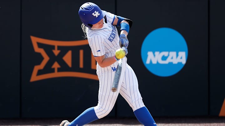 Kentucky's Ally Hutchins (7) drives in the game-winning run in the seventh inning of a softball game against Michigan in the first round of the Stillwater Regional of the NCAA Tournament in Stillwater, Okla., Friday, May 17, 2024.