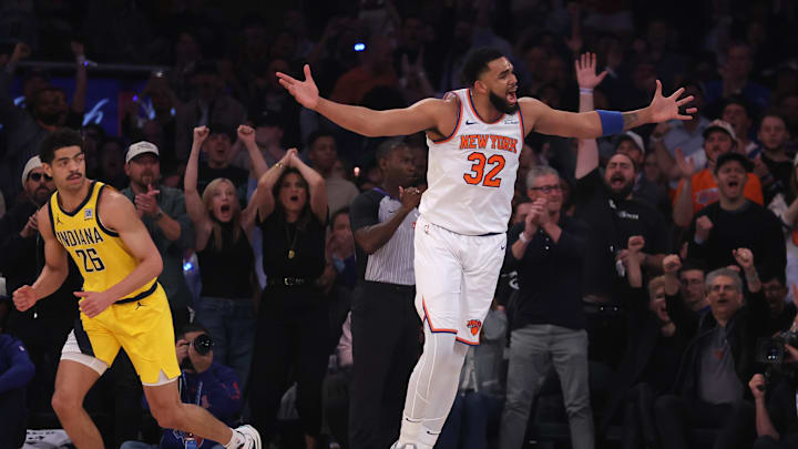 May 29, 2025; New York, New York, USA; New York Knicks center Karl-Anthony Towns (32) reacts in the first quarter against the Indiana Pacers during game five of the eastern conference finals for the 2025 NBA Playoffs at Madison Square Garden. Mandatory Credit: Brad Penner-Imagn Images