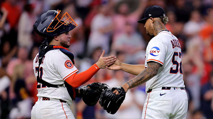 Jun 26, 2025; Houston, Texas, USA; Houston Astros pitcher Bryan Abreu (52) is congratulated by Houston Astros catcher Yainer Diaz (21) after the final out against the Philadelphia Phillies during the ninth inning at Daikin Park. Jun 26, 2025; Houston, Texas, USA; Houston Astros pitcher Bryan Abreu (52) is congratulated by Houston Astros catcher Yainer Diaz (21) after the final out against the Philadelphia Phillies during the ninth inning at Daikin Park.