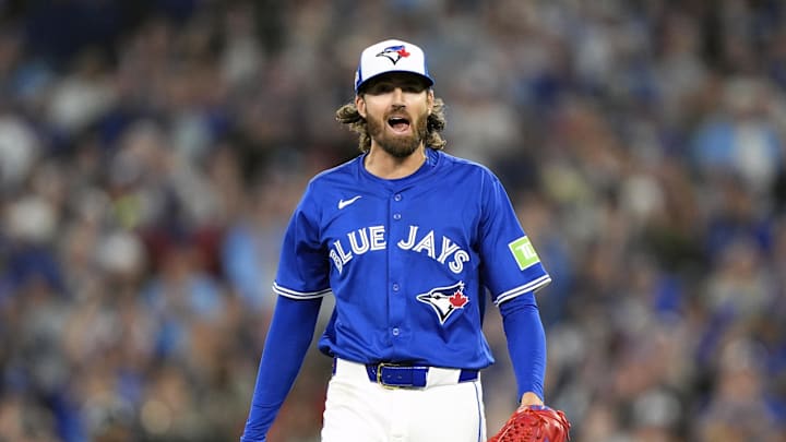 Oct 12, 2025; Toronto, Ontario, CAN; Toronto Blue Jays pitcher Kevin Gausman (34) reacts in the third inning against the Seattle Mariners during game one of the ALCS round for the 2025 MLB playoffs at Rogers Centre Oct 12, 2025; Toronto, Ontario, CAN; Toronto Blue Jays pitcher Kevin Gausman (34) reacts in the third inning against the Seattle Mariners during game one of the ALCS round for the 2025 MLB playoffs at Rogers Centre