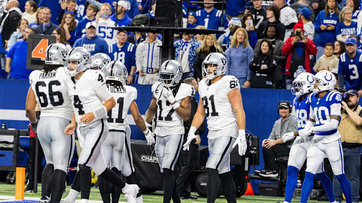 Dec 31, 2023; Indianapolis, Indiana, USA; Las Vegas Raiders wide receiver Davante Adams (17) celebrates his touchdown with teammates in the second half against the Indianapolis Colts at Lucas Oil Stadium. Mandatory Credit: Trevor Ruszkowski-USA TODAY Sports