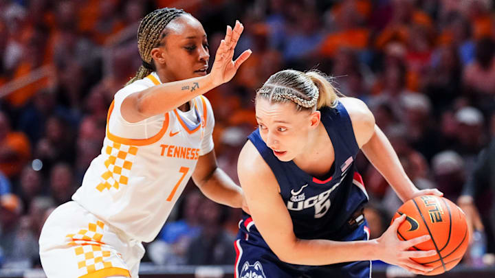 Tennessee guard Samara Spencer (7) defends UConn guard Paige Bueckers (5) during a women's college basketball game between the Lady Vols and UConn at Thompson-Boling Arena at Food City Center in Knoxville on Thursday, February 6, 2025. Tennessee guard Samara Spencer (7) defends UConn guard Paige Bueckers (5) during a women's college basketball game between the Lady Vols and UConn at Thompson-Boling Arena at Food City Center in Knoxville on Thursday, February 6, 2025.