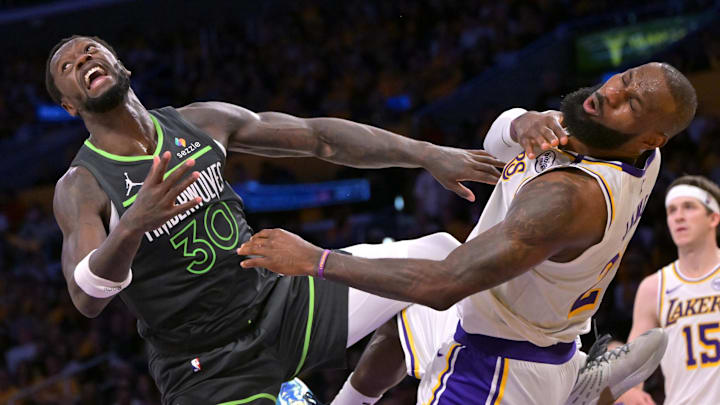 Apr 19, 2025; Los Angeles, California, USA; Los Angeles Lakers forward LeBron James (23) reacts after taking an elbow from Minnesota Timberwolves forward Julius Randle (30) in the second half at Crypto.com Arena. Mandatory Credit: Jayne Kamin-Oncea-Imagn Images Apr 19, 2025; Los Angeles, California, USA; Los Angeles Lakers forward LeBron James (23) reacts after taking an elbow from Minnesota Timberwolves forward Julius Randle (30) in the second half at Crypto.com Arena. Mandatory Credit: Jayne Kamin-Oncea-Imagn Images