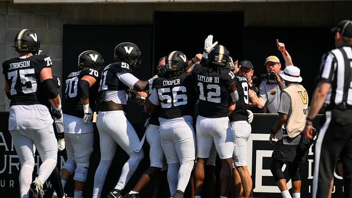 Sep 19, 2026; Nashville, Tennessee, USA; Vanderbilt Commodores running back Makhilyn Young (22) celebrates with his teammates after scoring a touchdown against the NC State Wolfpack during the second half at FirstBank Stadium. Mandatory Credit: Steve Roberts-Imagn Images Sep 19, 2026; Nashville, Tennessee, USA; Vanderbilt Commodores running back Makhilyn Young (22) celebrates with his teammates after scoring a touchdown against the NC State Wolfpack during the second half at FirstBank Stadium. Mandatory Credit: Steve Roberts-Imagn Images