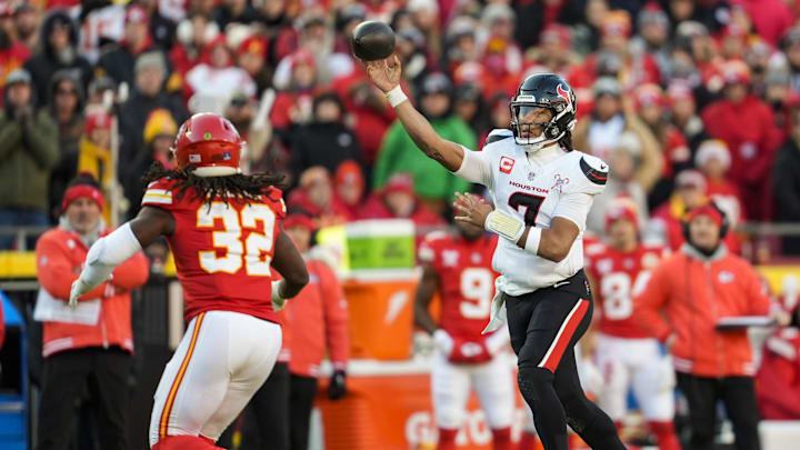 Dec 21, 2024; Kansas City, Missouri, USA; Houston Texans quarterback C.J. Stroud (7) throws a pass against Kansas City Chiefs linebacker Nick Bolton (32) during the second half at GEHA Field at Arrowhead Stadium. Mandatory Credit: Jay Biggerstaff-Imagn Images Dec 21, 2024; Kansas City, Missouri, USA; Houston Texans quarterback C.J. Stroud (7) throws a pass against Kansas City Chiefs linebacker Nick Bolton (32) during the second half at GEHA Field at Arrowhead Stadium. Mandatory Credit: Jay Biggerstaff-Imagn Images
