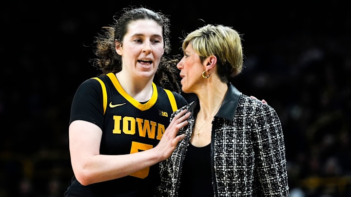Iowa center Ava Heiden (5) talks to Iowa head coach Jan Jensen as she comes off the court during a game against the Oregon Ducks Jan. 15, 2026 at Carver-Hawkeye Arena in Iowa City, Iowa. Iowa center Ava Heiden (5) talks to Iowa head coach Jan Jensen as she comes off the court during a game against the Oregon Ducks Jan. 15, 2026 at Carver-Hawkeye Arena in Iowa City, Iowa.