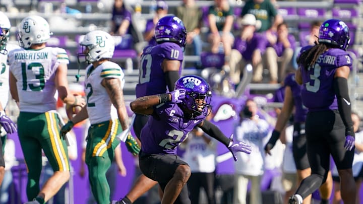 Oct 18, 2025; Fort Worth, Texas, USA; TCU Horned Frogs safety Bud Clark (21) reacts after sacking Baylor Bears quarterback Sawyer Robertson (13) during the second half of a game at Amon G. Carter Stadium. Mandatory Credit: Raymond Carlin III-Imagn Images