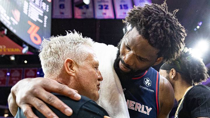 Jan 22, 2024; Philadelphia, Pennsylvania, USA; Philadelphia 76ers center Joel Embiid (21) talks with his former coach and current San Antonio Spurs assistant Brett Brown after scoring 70 points in a victory at Wells Fargo Center. Mandatory Credit: Bill Streicher-USA TODAY Sports Jan 22, 2024; Philadelphia, Pennsylvania, USA; Philadelphia 76ers center Joel Embiid (21) talks with his former coach and current San Antonio Spurs assistant Brett Brown after scoring 70 points in a victory at Wells Fargo Center. Mandatory Credit: Bill Streicher-USA TODAY Sports
