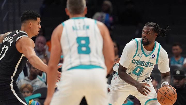 Oct 6, 2026; Charlotte, North Carolina, USA;  Charlotte Hornets center Naz Reid (0) handles the ball against the Brooklyn Nets during the first quarter at Spectrum Center.  Mandatory Credit: Jim Dedmon-Imagn Images