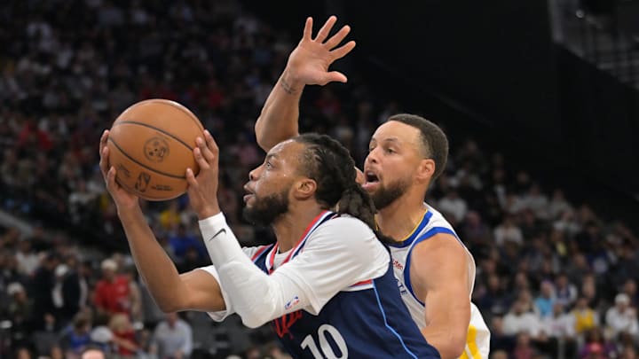Darius Garland and Stephen Curry