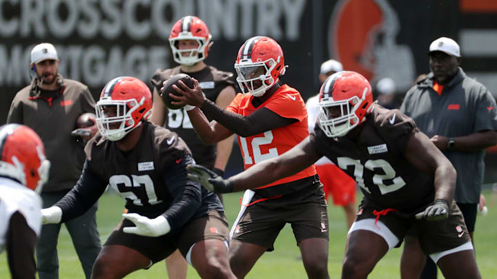Browns quarterback Shedeur Sanders takes a snap during minicamp, Tuesday, June 10, 2025, in Berea.