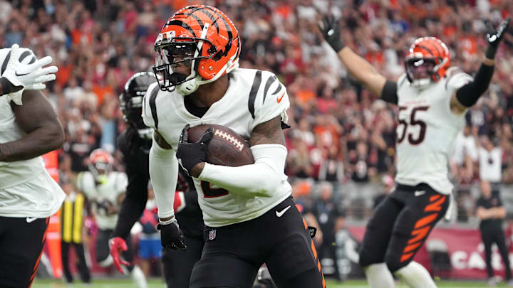 Oct 8, 2023; Glendale, Arizona, United States; Cincinnati Bengals cornerback Cam Taylor-Britt (29) runs his interception in for a touchdown against the Arizona Cardinals at State Farm Stadium. Mandatory Credit: Joe Rondone-Imagn Images Oct 8, 2023; Glendale, Arizona, United States; Cincinnati Bengals cornerback Cam Taylor-Britt (29) runs his interception in for a touchdown against the Arizona Cardinals at State Farm Stadium. Mandatory Credit: Joe Rondone-Imagn Images