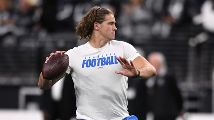 Jan 9, 2022; Paradise, Nevada, USA; Los Angeles Chargers quarterback Justin Herbert (10) throws during pregame warmups before the game against the Las Vegas Raiders at Allegiant Stadium.