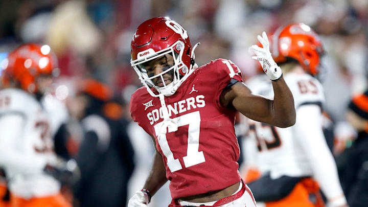 Oklahoma's Marvin Mims Jr. (17) celebrates a return on a kick off  in the first half during the