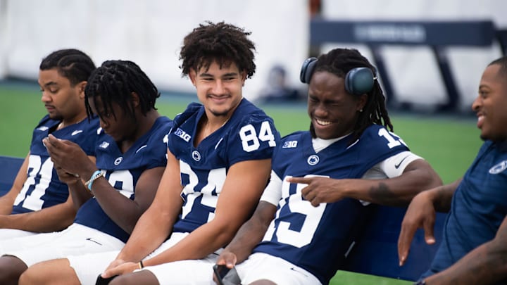 Penn State wide receivers Peter Gonzalez (84) and Josiah Brown (19) laugh together during football media day in Holuba Hall on Saturday, August 2, 2025, in State College.