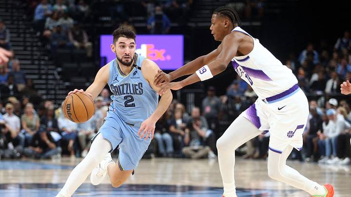Oct 21, 2026; Memphis, Tennessee, USA; Memphis Grizzlies guard Ty Jerome (2) drives against Utah Jazz guard Ace Bailey (19) during the second quarter at FedExForum. Mandatory Credit: Petre Thomas-Imagn Images Oct 21, 2026; Memphis, Tennessee, USA; Memphis Grizzlies guard Ty Jerome (2) drives against Utah Jazz guard Ace Bailey (19) during the second quarter at FedExForum. Mandatory Credit: Petre Thomas-Imagn Images