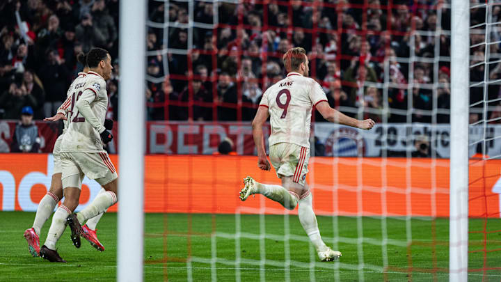 Harry Kane celebrating after scoring for Bayern Munich against Bayer Leverkusen.