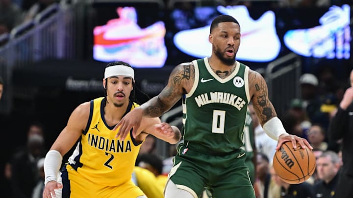 Apr 21, 2024; Milwaukee, Wisconsin, USA; Milwaukee Bucks guard Damian Lillard (0) drives for the