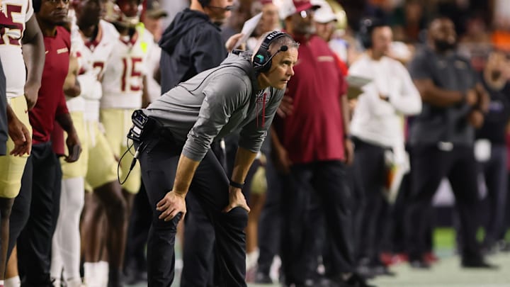 Oct 26, 2024; Miami Gardens, Florida, USA; Florida State Seminoles head coach Mike Norvell watches from the sideline against the Miami Hurricanes during the second quarter at Hard Rock Stadium. Mandatory Credit: Sam Navarro-Imagn Images