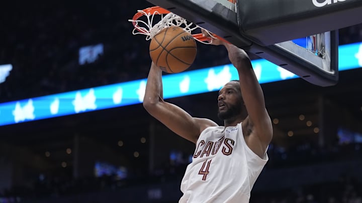 Feb 12, 2025; Toronto, Ontario, CAN; Cleveland Cavaliers forward Evan Mobley (4) dunks the ball against the Toronto Raptors during the second half at Scotiabank Arena. Mandatory Credit: John E. Sokolowski-Imagn Images