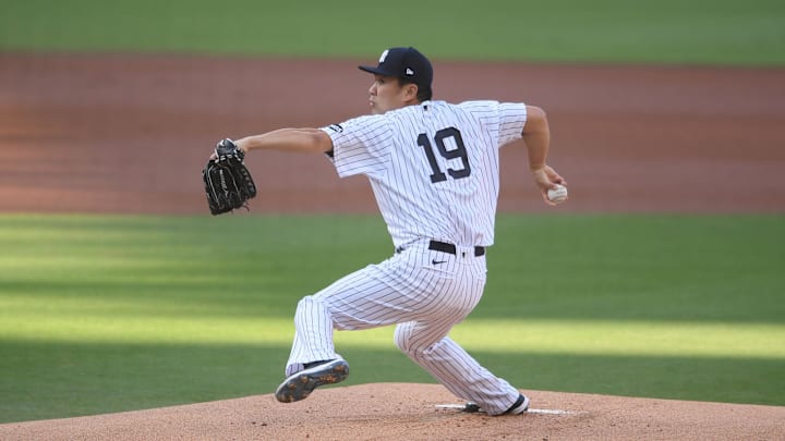 New York Yankees starting pitcher Masahiro Tanaka (19) pitches against the Tampa Bay Rays in the first inning during game three of the 2020 ALDS at Petco Park. 