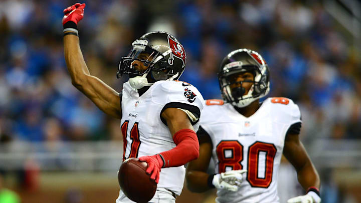 Nov 24, 2013; Detroit, MI, USA; Tampa Bay Buccaneers wide receiver Tiquan Underwood (11) celebrates after catching a pass for a touchdown during the second quarter against the Detroit Lions at Ford Field. Mandatory Credit: Andrew Weber-Imagn Images