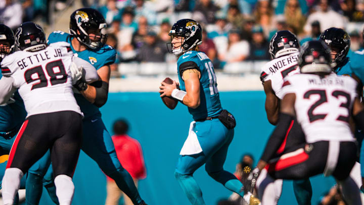 Dec 1, 2024; Jacksonville, Florida, USA; Jacksonville Jaguars quarterback Trevor Lawrence (16) drops back to pass against the Houston Texans in the first quarter at EverBank Stadium. Mandatory Credit: Jeremy Reper-Imagn Images