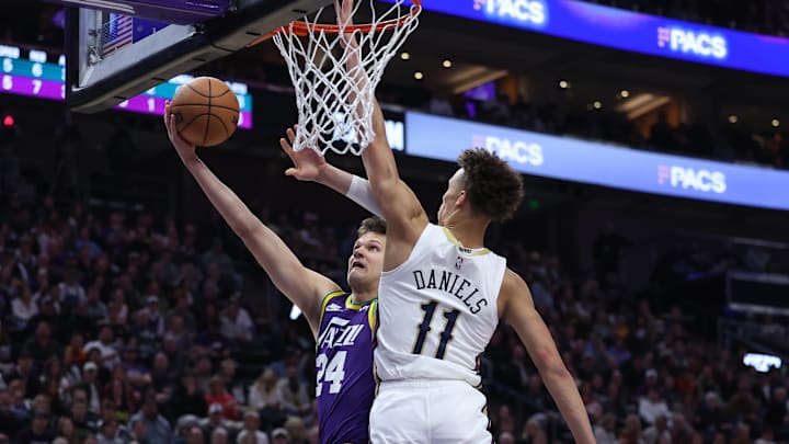 Nov 27, 2023; Salt Lake City, Utah, USA; Utah Jazz center Walker Kessler (24) goes to the basket against New Orleans Pelicans guard Dyson Daniels (11) in the first quarter at Delta Center.