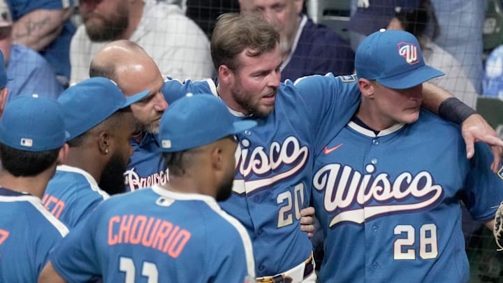 Milwaukee Brewers left fielder Brandon Lockridge (20) waits to be carted off the field after being injured during the fourth inning of their game against the New York Yankees Friday, May 8, 2026 at American Family Field in Milwaukee, Wisconsin.
