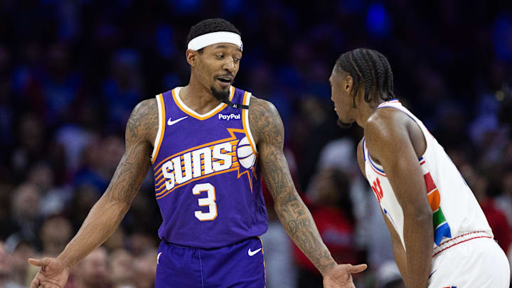 Jan 6, 2025; Philadelphia, Pennsylvania, USA; Phoenix Suns guard Bradley Beal (3) and Philadelphia 76ers guard Tyrese Maxey (0) talk during a break in action during the fourth quarter at Wells Fargo Center. Mandatory Credit: Bill Streicher-Imagn Images