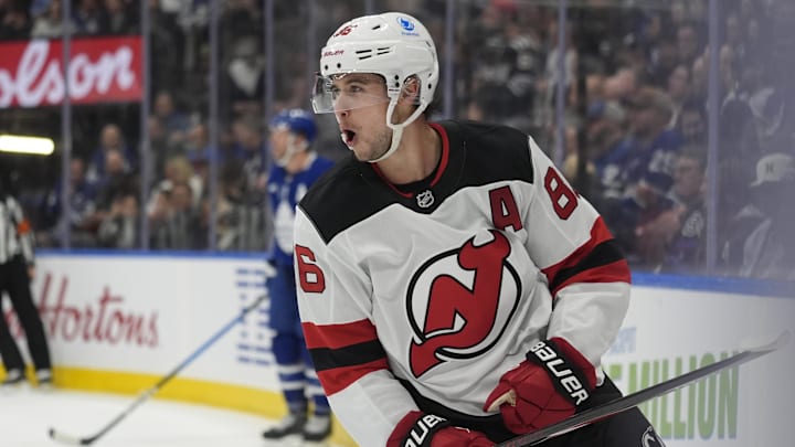 Oct 21, 2025; Toronto, Ontario, CAN; New Jersey Devils forward Jack Hughes (86) reacts after scoring against the Toronto Maple Leafs during the second period at Scotiabank Arena. Mandatory Credit: John E. Sokolowski-Imagn Images