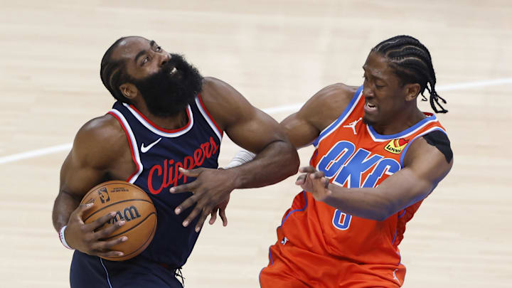 Nov 11, 2024; Oklahoma City, Oklahoma, USA; Los Angeles Clippers guard James Harden (1) drives to the basket against Oklahoma City Thunder forward Jalen Williams (8) during the first quarter at Paycom Center. Mandatory Credit: Alonzo Adams-Imagn Images Nov 11, 2024; Oklahoma City, Oklahoma, USA; Los Angeles Clippers guard James Harden (1) drives to the basket against Oklahoma City Thunder forward Jalen Williams (8) during the first quarter at Paycom Center. Mandatory Credit: Alonzo Adams-Imagn Images