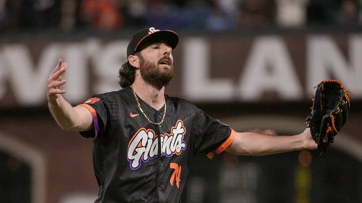 San Francisco, California, USA;  San Francisco Giants pitcher Ryan Walker (74) celebrates after defeating the Chicago Cubs at Oracle Park. Mandatory Credit: Ed Szczepanski-Imagn Images