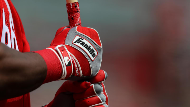 A view of the Franklin batting gloves worn by a Cincinnati Reds player.