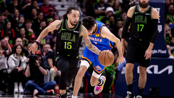 Apr 29, 2024; New Orleans, Louisiana, USA; New Orleans Pelicans guard Jose Alvarado (15) brings the ball up court against Oklahoma City Thunder forward Chet Holmgren (7) during the first half of game four of the first round for the 2024 NBA playoffs at Smoothie King Center. Mandatory Credit: Stephen Lew-USA TODAY Sports
