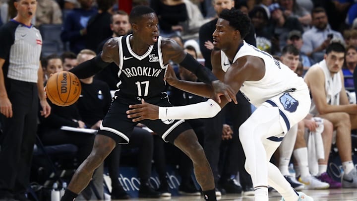 Oct 30, 2024; Memphis, Tennessee, USA; Brooklyn Nets guard Dennis Schroder (17) dribbles as Memphis Grizzlies forward Jaren Jackson Jr. (13) defends during the second half at FedExForum. Mandatory Credit: Petre Thomas-Imagn Images