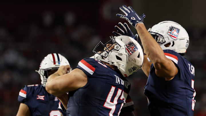 Oct 5, 2024; Tucson, Arizona, USA; Arizona Wildcats defensive lineman Stanley Ta’ufo’ou (47) celebrates a sack against Texas Tech Red Raiders during second quarter at Arizona Stadium. 