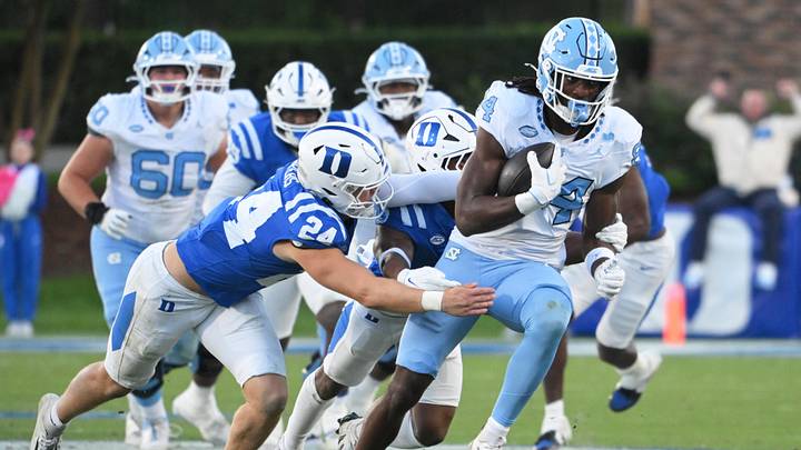 Oct 17, 2026; Durham, North Carolina, USA; North Carolina Tar Heels tight end Shamar Easter (84) runs the ball during the third quarter against Duke Blue Devils linebacker Bradley Gompers (24) and Duke Blue Devils saftey Patrick Smith-Young (2) at Wallace Wade Stadium. Mandatory Credit: Zachary Taft-Imagn Images Oct 17, 2026; Durham, North Carolina, USA; North Carolina Tar Heels tight end Shamar Easter (84) runs the ball during the third quarter against Duke Blue Devils linebacker Bradley Gompers (24) and Duke Blue Devils saftey Patrick Smith-Young (2) at Wallace Wade Stadium. Mandatory Credit: Zachary Taft-Imagn Images