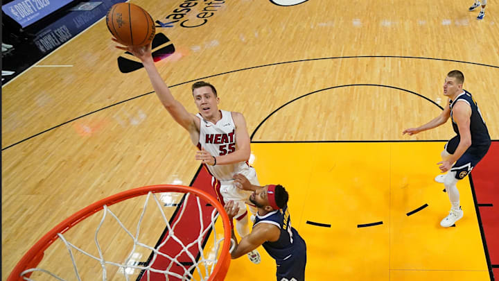 Jun 9, 2023; Miami, Florida, USA; Miami Heat forward Duncan Robinson (55) shoots the ball against