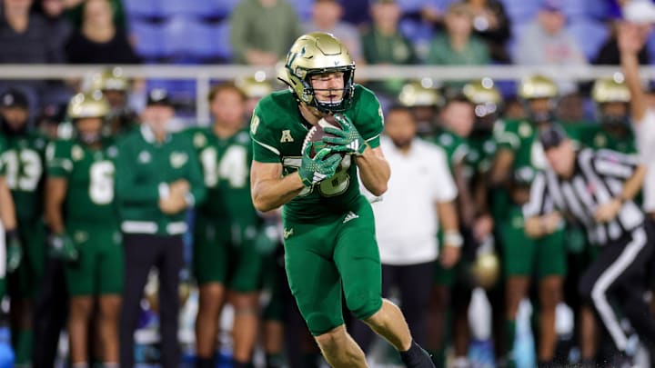 Dec 21, 2023; Boca Raton, FL, USA;  South Florida Bulls wide receiver Sean Atkins (38) catches a pass for a touchdown against the Syracuse Orange in the third quarter during the RoofClaim.com Boca Raton Bowl at FAU Stadium. Mandatory Credit: Nathan Ray Seebeck-USA TODAY Sports