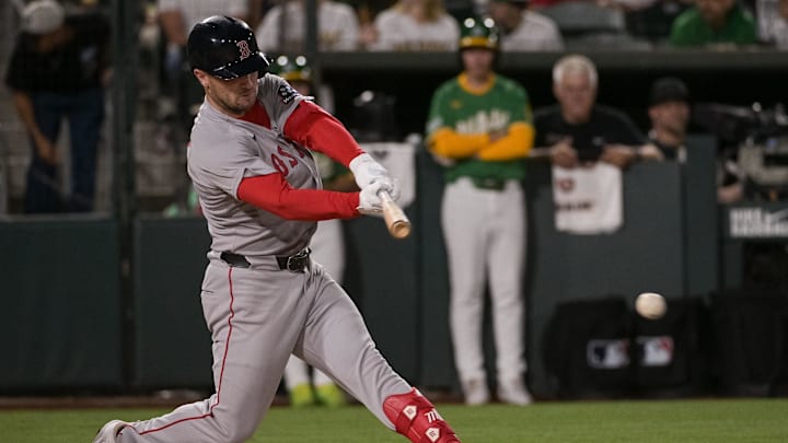 Sep 8, 2025; West Sacramento, California, USA; Boston Red Sox third baseman Alex Bregman (2) hits an rbi single against the Athletics during the fifth inning at Sutter Health Park. Mandatory Credit: Ed Szczepanski-Imagn Images