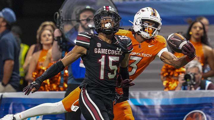 Virginia Tech Hokies receiver Donavon Greene attempts a one-handed catch behind South Carolina Gamecocks DB Brandon Cisse