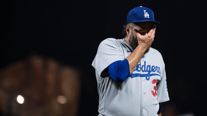 Sep 29, 2023; San Francisco, California, USA; Los Angeles Dodgers starting pitcher Lance Lynn (35) reacts as he walks off the field after throwing against the San Francisco Giants  during the first inning at Oracle Park. Mandatory Credit: John Hefti-Imagn Images