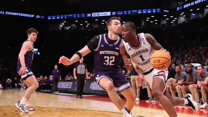 Florida Atlantic Owls guard Johnell Davis (1) drives against Northwestern.